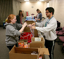Lift Students package goods for LaGrange-Troup Coalition's Warming Center