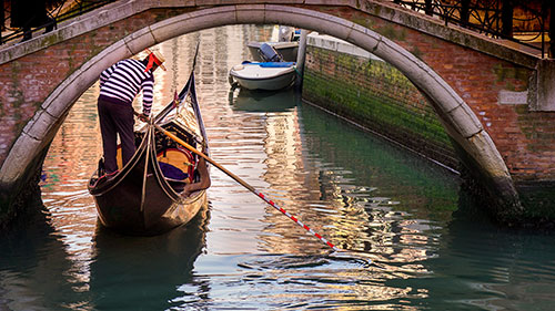 Water way in Venice, Italy with small boat
