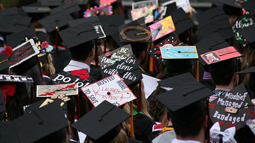 overhead view of a group of commencement mortar boards