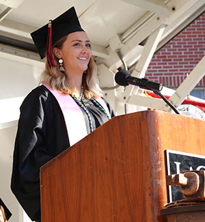 Caitlyn Deal stands at the podium