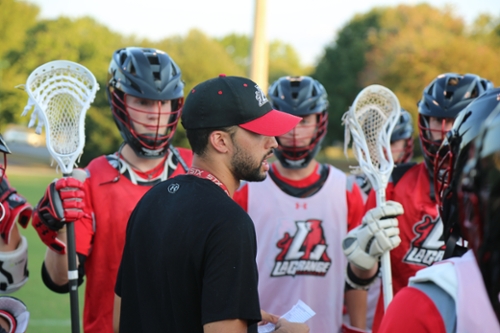 Lacrosse Head Coach talks to team