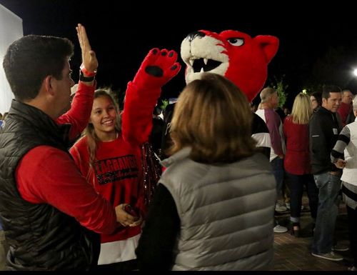 Pouncer celebrates with fans at Flashback Friday