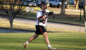Panther lacrosse player prepares to pass