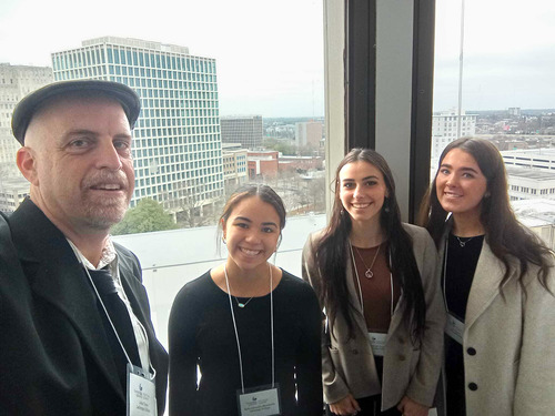 Students participate in conference