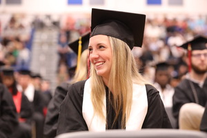 Senior graduates with degree