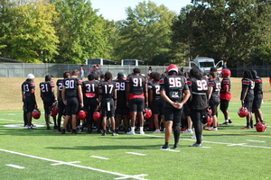 Team holds post game meeting