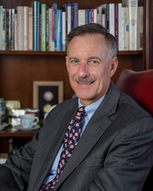 Former administrator returns to college in limited role