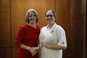 Business employee receives president award