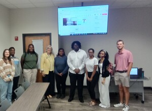 Students with government leader