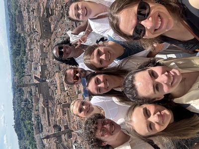 Students stand on top of building