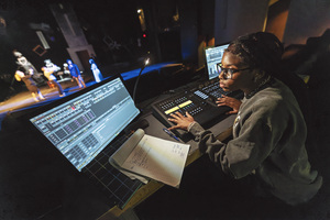 Student works on soundboard