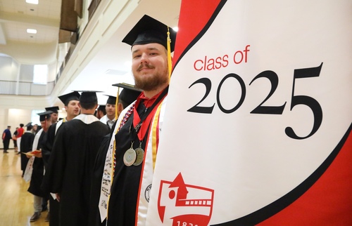 Graduate with class flag
