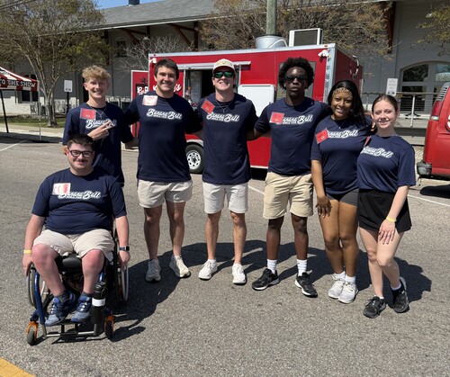 Students work at sporting event