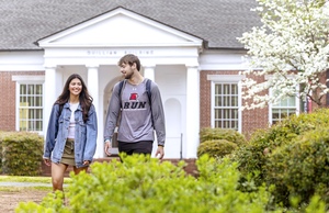 Students walking past Quillian Building