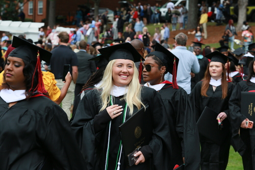 Graduate acknowledging the audience