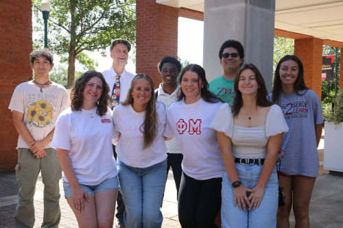 Members of the Pi SIgma Alpha Honor Society pose for a photo.