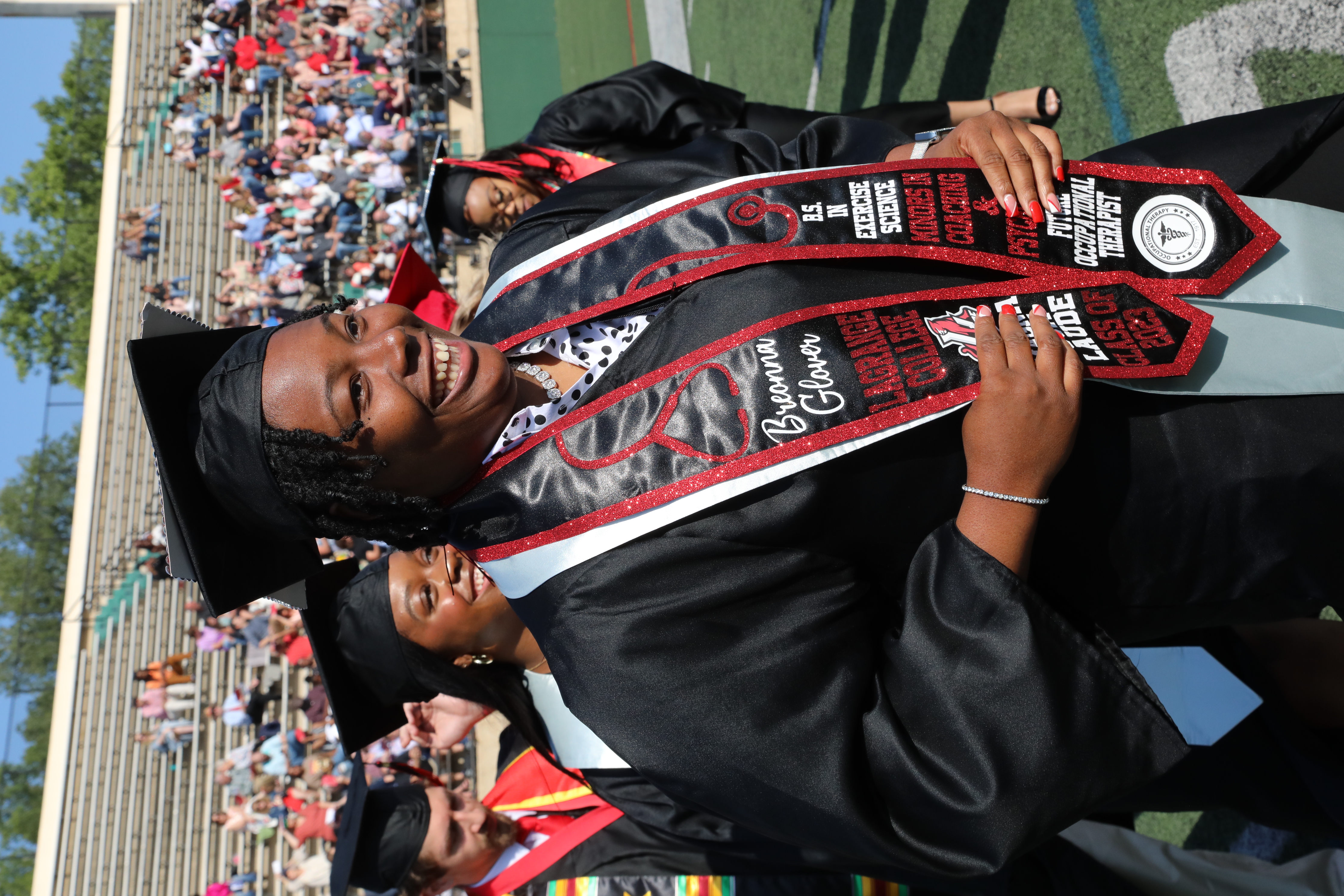 Student athlete crosses the stage at graduation