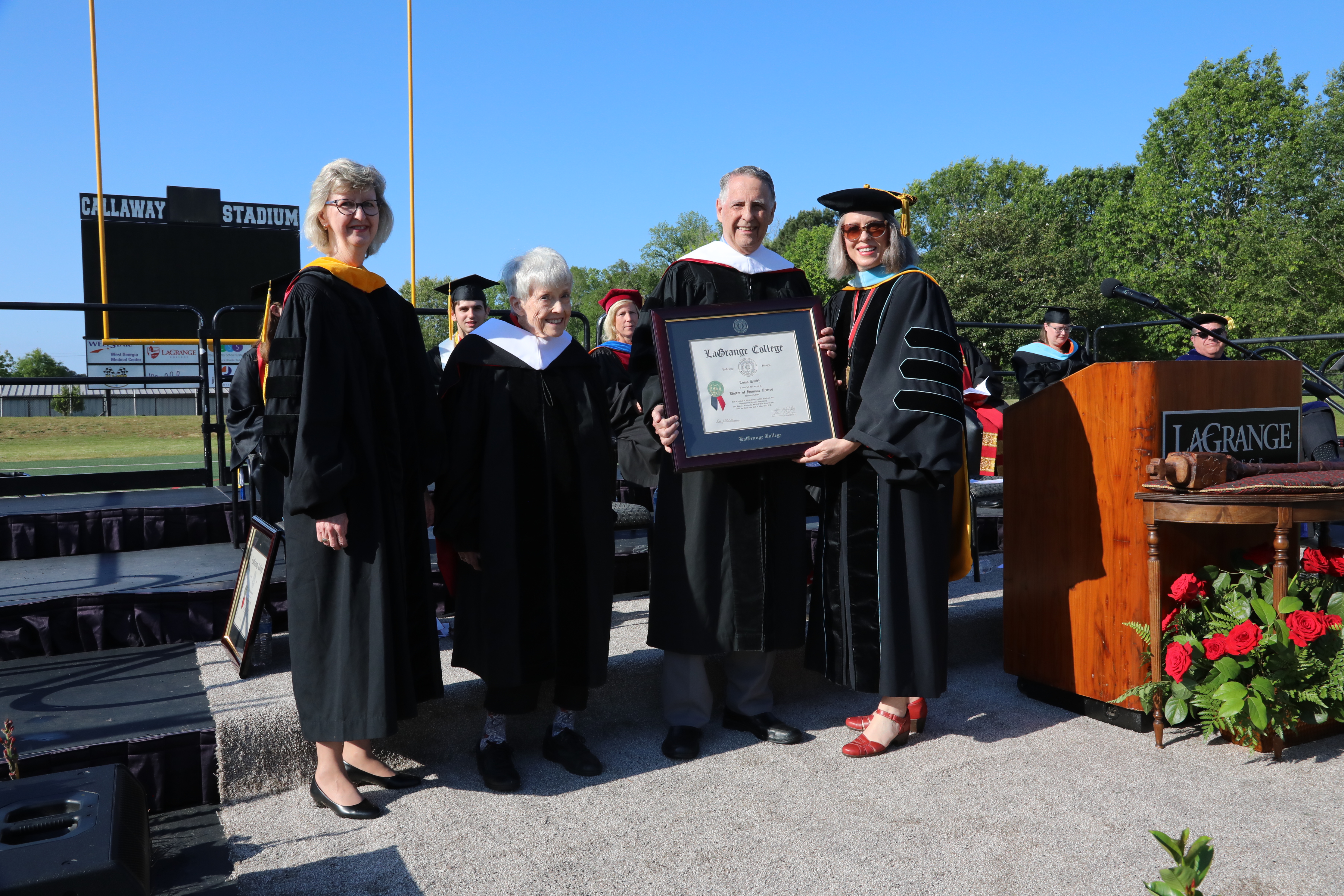 Longtime college supporters receive honorary degree