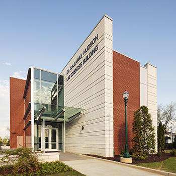 Exterior view of west end of Hudson Lab Sciences Building that shows building name at top