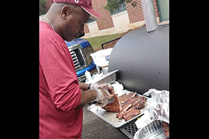 alum grills at Homecoming tailgate