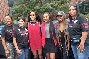 a group of female alumni at homecoming