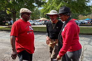 alumni chat at Homecoming