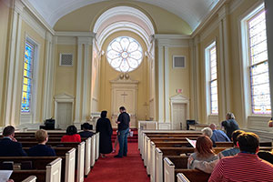 people gather for the memorial service