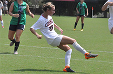 Women's soccer player during game