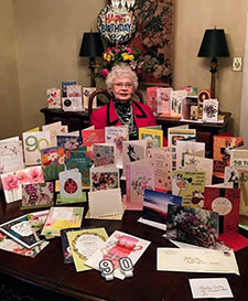 Cards surround Martha Estes HA'13 for her 90th birthday