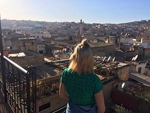 Jenna views a cityscape of Morocco