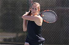Women's tennis player playing on the court